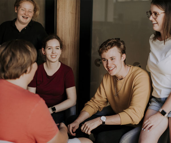 Group of young people laughing, having fun