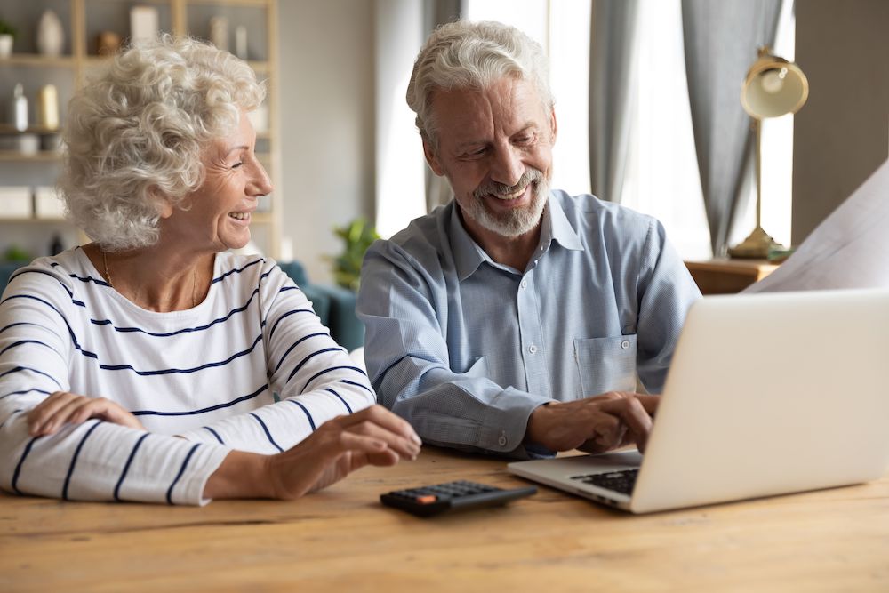 elderly couple writing will