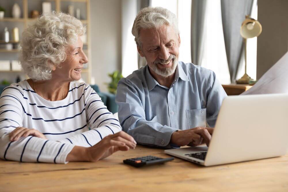 elderly couple discussing their will