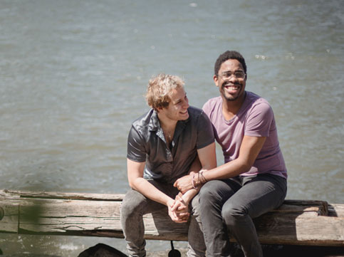 2 men sitting, laughing, emotionally psychological, image for help cancer, support for cancer patients & cancer support services