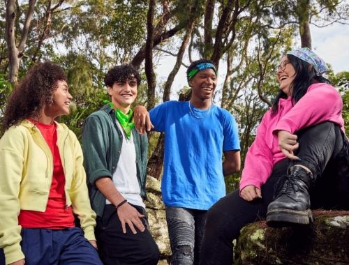 group of young people who benefit from regular giving charity donations