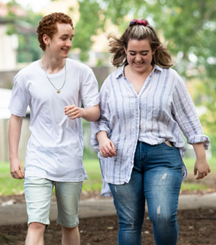 two young people walking and laughing image for youth ambassadors for canteen two young people walking and laughing image for youth ambassadors for canteen