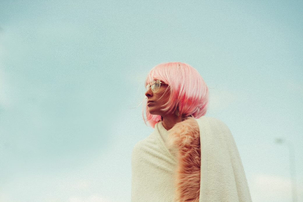 girl wearing pink wig