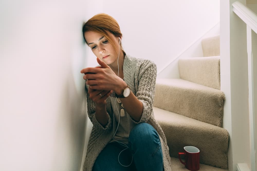 girl using phone 