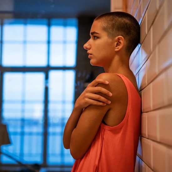 Girl trying to cope after cancer treatment