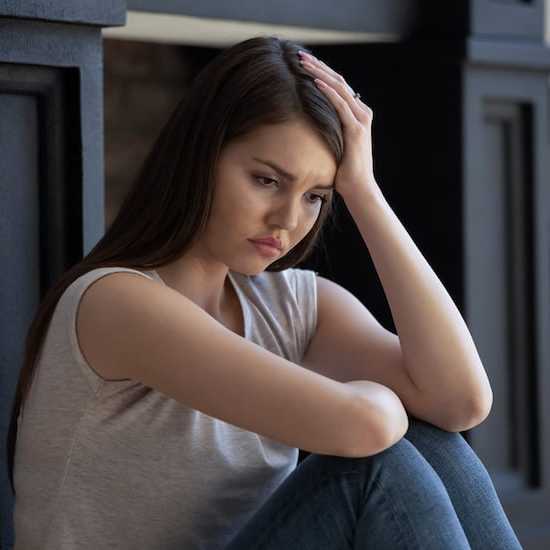 Young woman coping at home