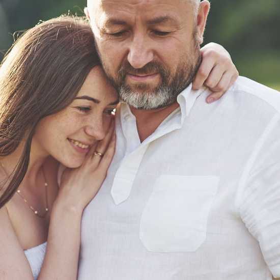 father and daughter hugging