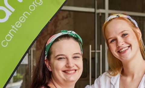 two young people wearing canteen bandannas