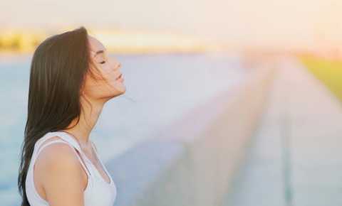 young person taking a breath in