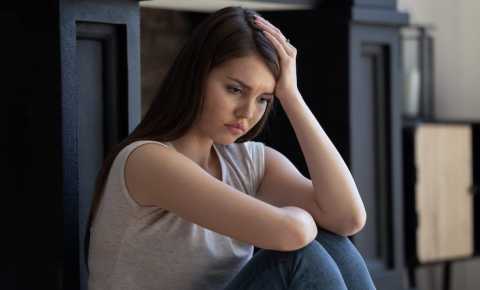 Young woman coping at home