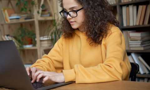 Young woman studying at university