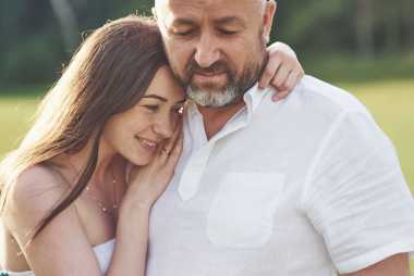 father and daughter hugging