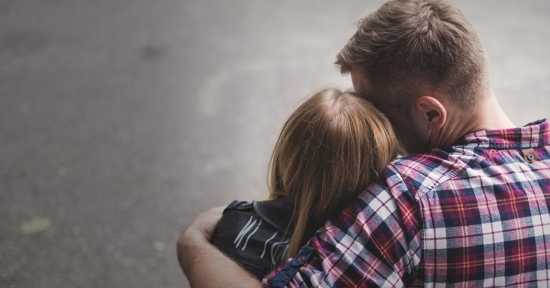 father and child hugging