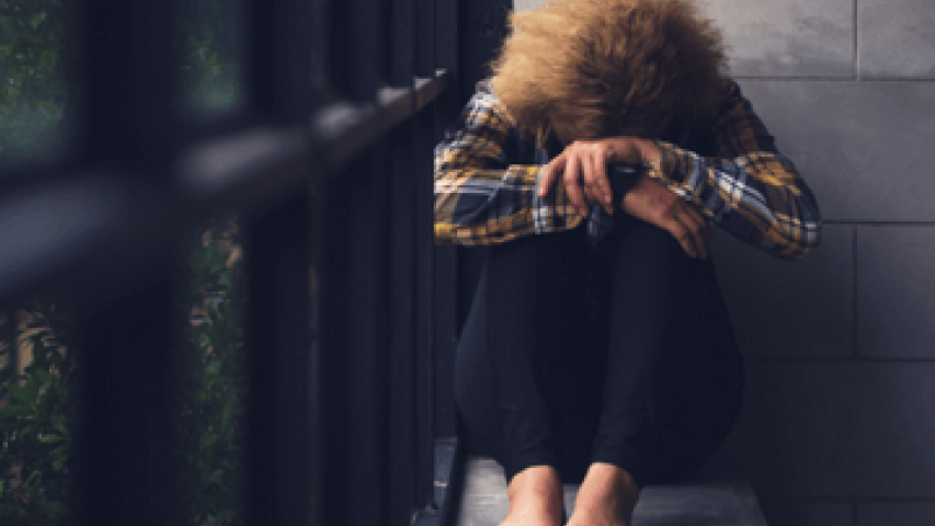 Teenager grieving over sibling's cancer