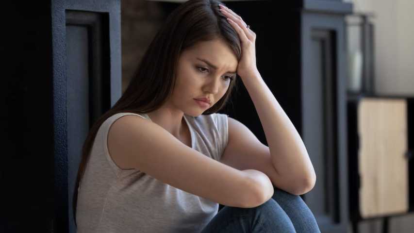 Young woman coping at home