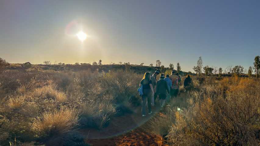 Group of young people walking on Anangu Island
