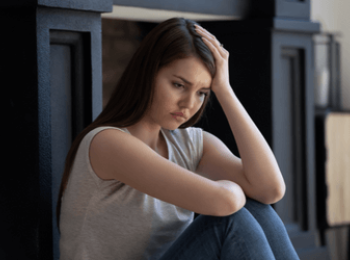 Young woman coping at home