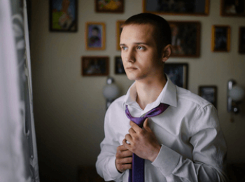 Young man getting ready for work