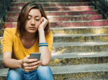 Girl looking at her phone