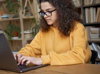 Young woman studying at university