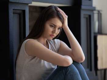 Young woman coping at home