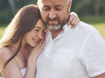 father and daughter hugging